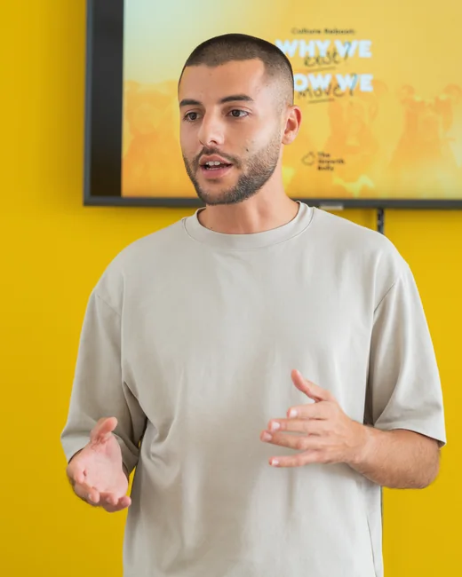 Stephen Ellul leading a team session at the agency office